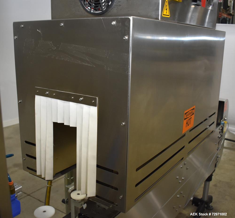 Used Axon Styrotech EZ-Seal EZ-200 Single Head Tamper Evident Neck Bander. Designed to run up to 120 containers per minute. 1-60/115 volt, 10 amp, serial # T-100210B, built 05/2010. Includes a heat s...