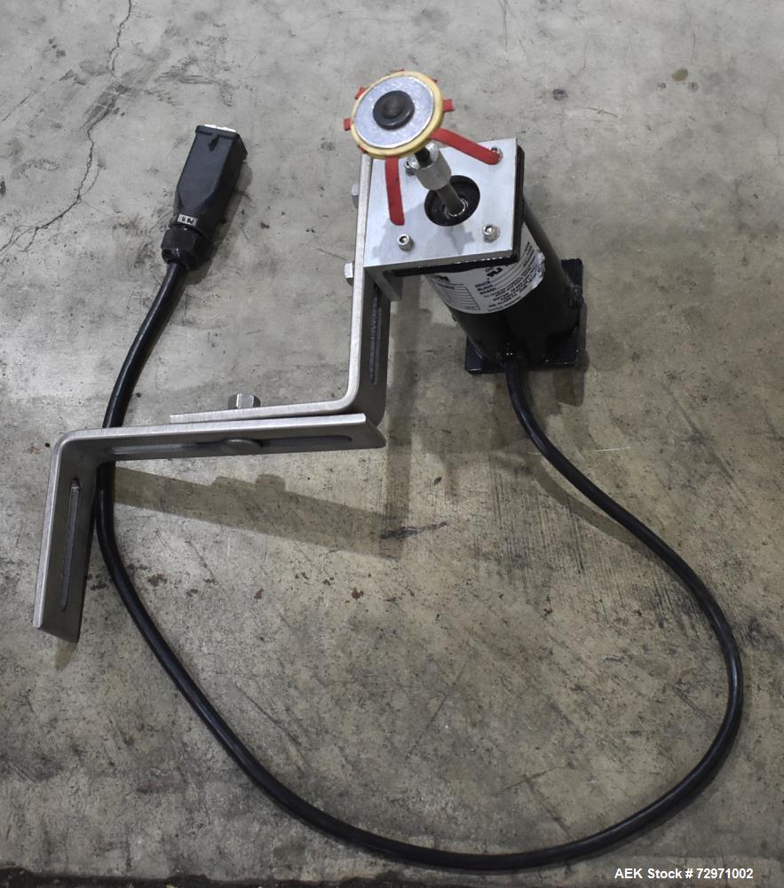 Used Axon Styrotech EZ-Seal EZ-200 Single Head Tamper Evident Neck Bander. Designed to run up to 120 containers per minute. 1-60/115 volt, 10 amp, serial # T-100210B, built 05/2010. Includes a heat s...
