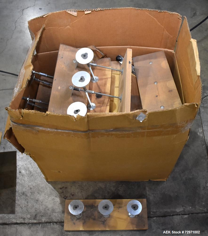 Used Axon Styrotech EZ-Seal EZ-200 Single Head Tamper Evident Neck Bander. Designed to run up to 120 containers per minute. 1-60/115 volt, 10 amp, serial # T-100210B, built 05/2010. Includes a heat s...