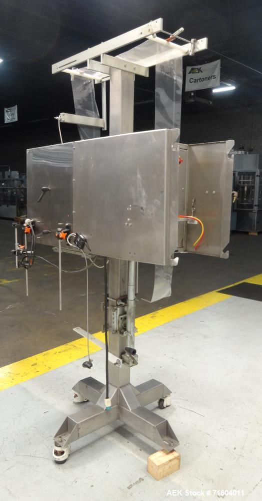 Used Axon EZ-300 Sleeve Labeler/Tamper Evident Band Applicator