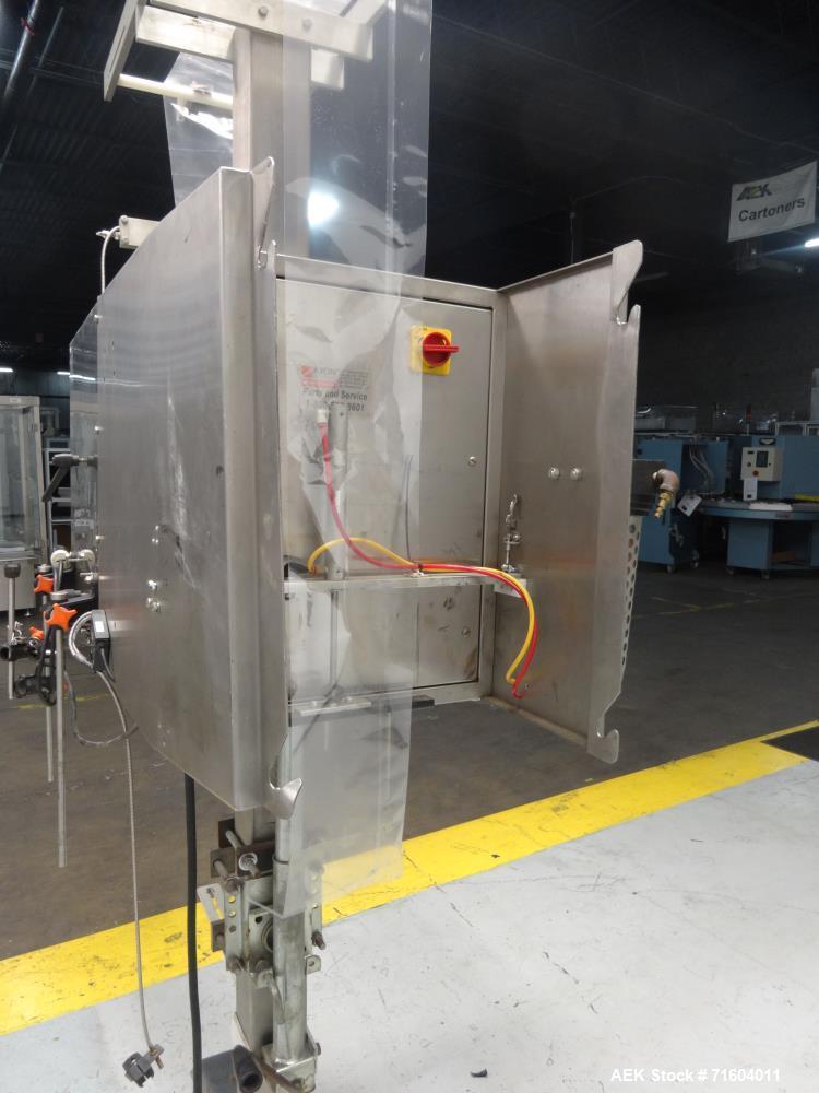 Used Axon EZ-300 Sleeve Labeler/Tamper Evident Band Applicator