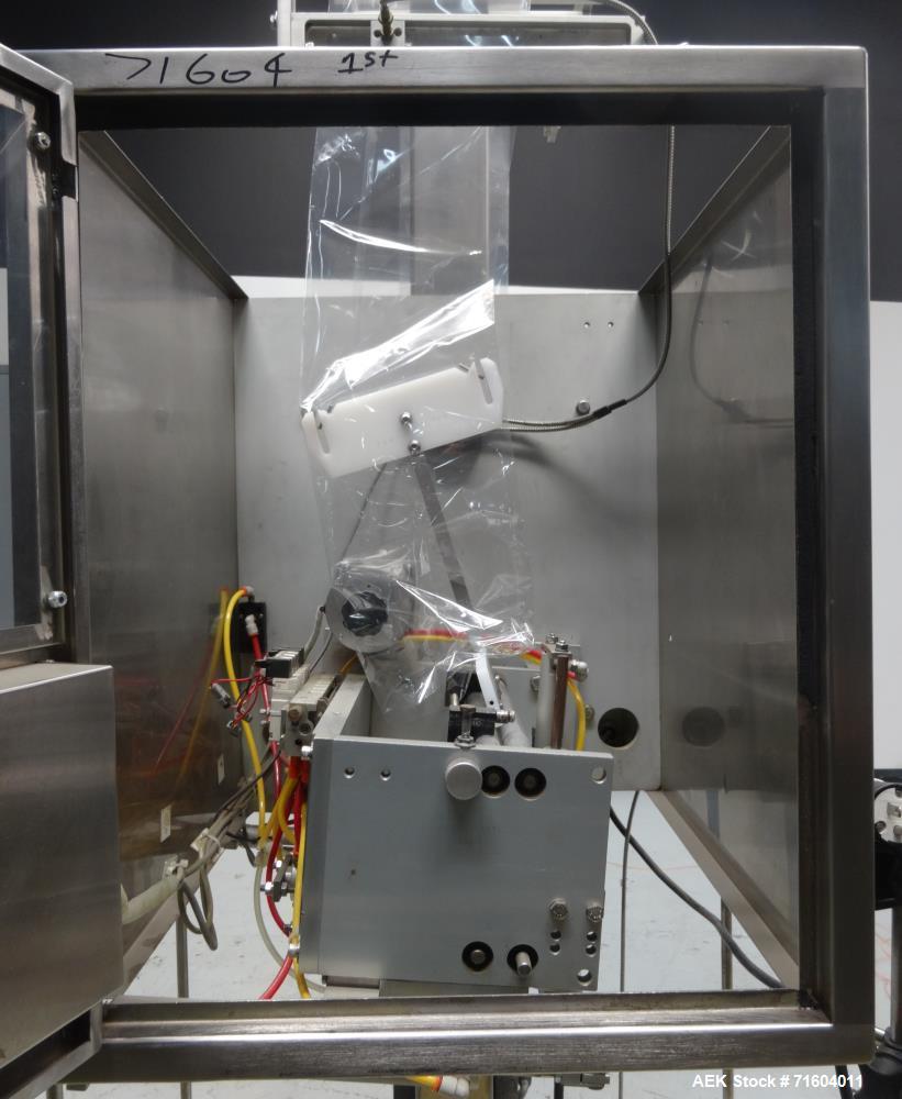 Used Axon EZ-300 Sleeve Labeler/Tamper Evident Band Applicator