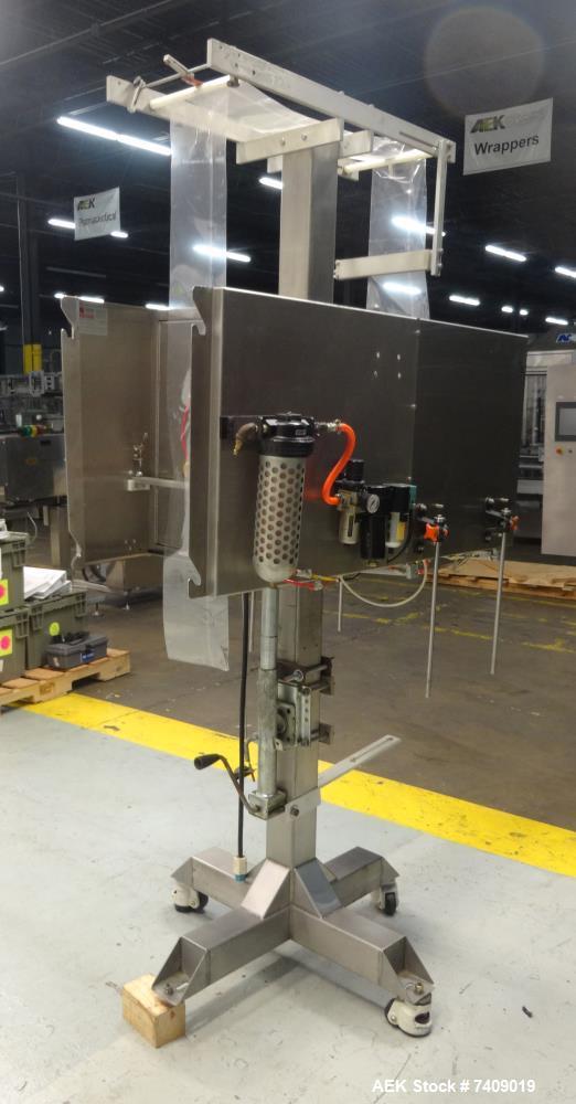 Used Axon EZ-300 Sleeve Labeler/Tamper Evident Band Applicator