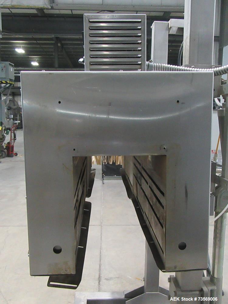 Used Axon Dual Zone Styrotech Shrink Tunnel, Model EZ-72-HT. Total tunnel length 72". 10-1/2" wide x 14" tall tunnel. Dual zone convective air heat tunnel. 1/60/230 Volt.