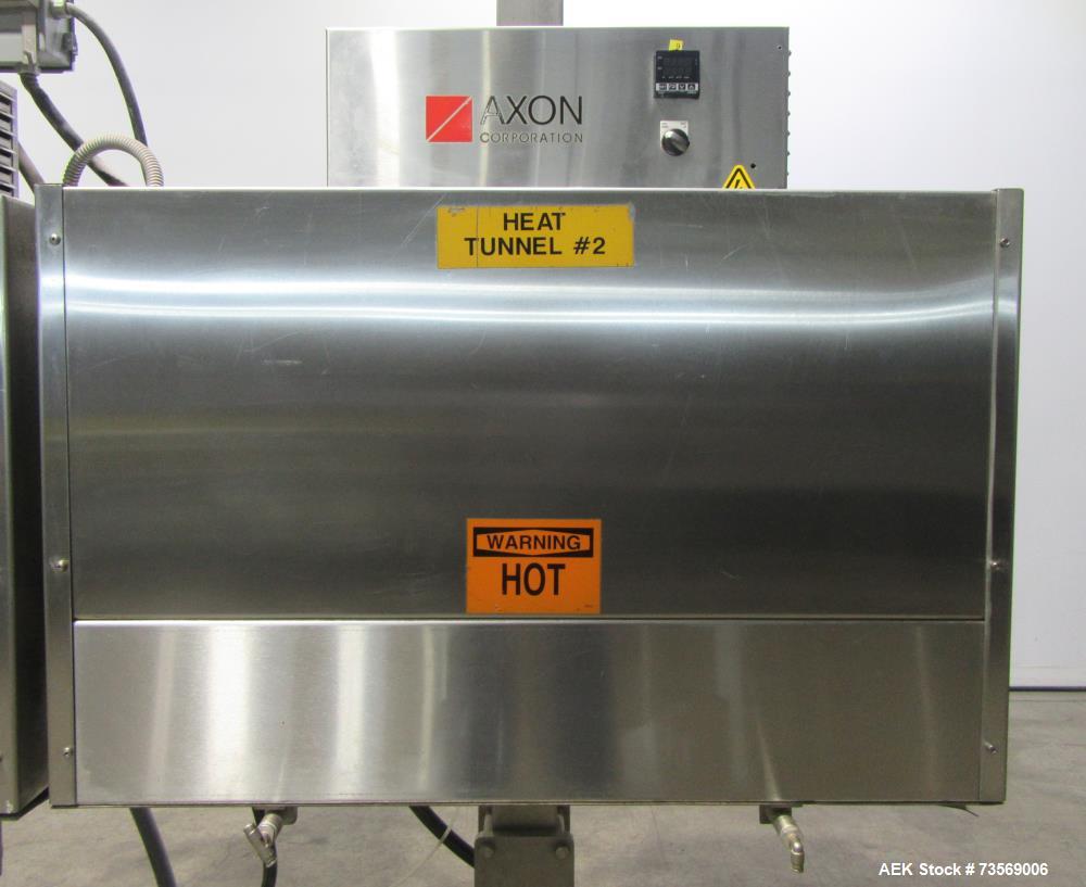 Used Axon Dual Zone Styrotech Shrink Tunnel, Model EZ-72-HT. Total tunnel length 72". 10-1/2" wide x 14" tall tunnel. Dual zone convective air heat tunnel. 1/60/230 Volt.
