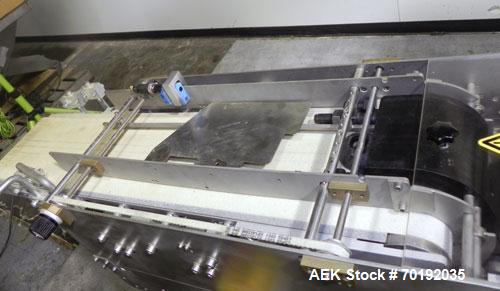 Used Fuji Intersleeve Model 3200H Horizontal sleeve labeler. Maximum speed 15,000/hour ( ref. sleeve 100 cl x 30lfw). Product diameter 8-40mm, product length 40-200mm. Last running plastic vials off ...