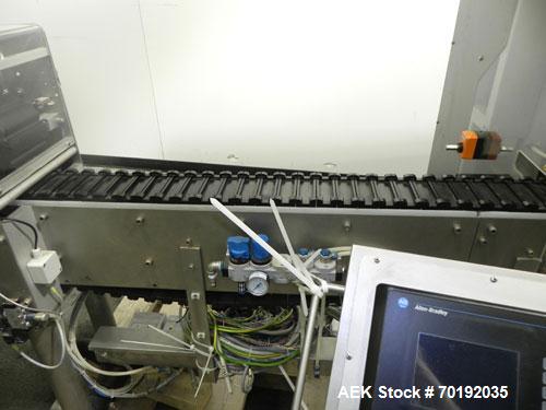 Used Fuji Intersleeve Model 3200H Horizontal sleeve labeler. Maximum speed 15,000/hour ( ref. sleeve 100 cl x 30lfw). Product diameter 8-40mm, product length 40-200mm. Last running plastic vials off ...