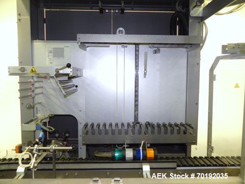 Used Fuji Intersleeve Model 3200H Horizontal sleeve labeler. Maximum speed 15,000/hour ( ref. sleeve 100 cl x 30lfw). Product diameter 8-40mm, product length 40-200mm. Last running plastic vials off ...