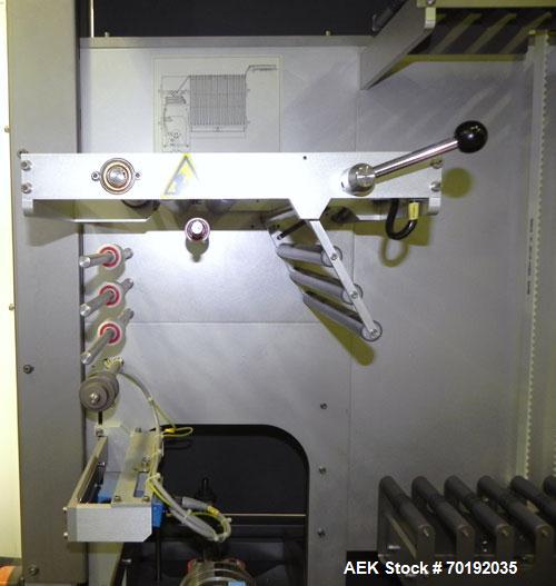Used Fuji Intersleeve Model 3200H Horizontal sleeve labeler. Maximum speed 15,000/hour ( ref. sleeve 100 cl x 30lfw). Product diameter 8-40mm, product length 40-200mm. Last running plastic vials off ...