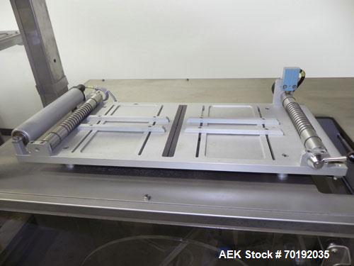 Used Fuji Intersleeve Model 3200H Horizontal sleeve labeler. Maximum speed 15,000/hour ( ref. sleeve 100 cl x 30lfw). Product diameter 8-40mm, product length 40-200mm. Last running plastic vials off ...