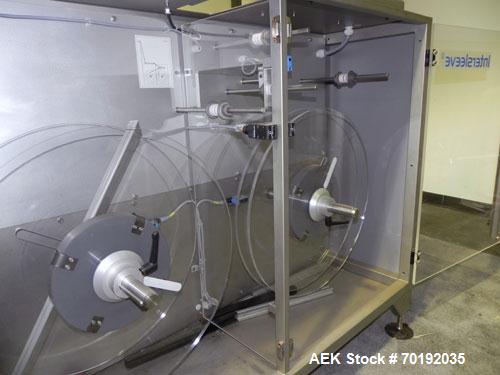 Used Fuji Intersleeve Model 3200H Horizontal sleeve labeler. Maximum speed 15,000/hour ( ref. sleeve 100 cl x 30lfw). Product diameter 8-40mm, product length 40-200mm. Last running plastic vials off ...