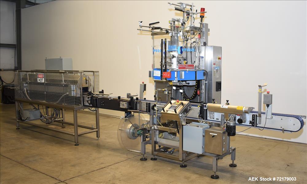 Used- Graham Packaging "Sleevit" Sleeve Labeler with Steam Shrink Tunnel