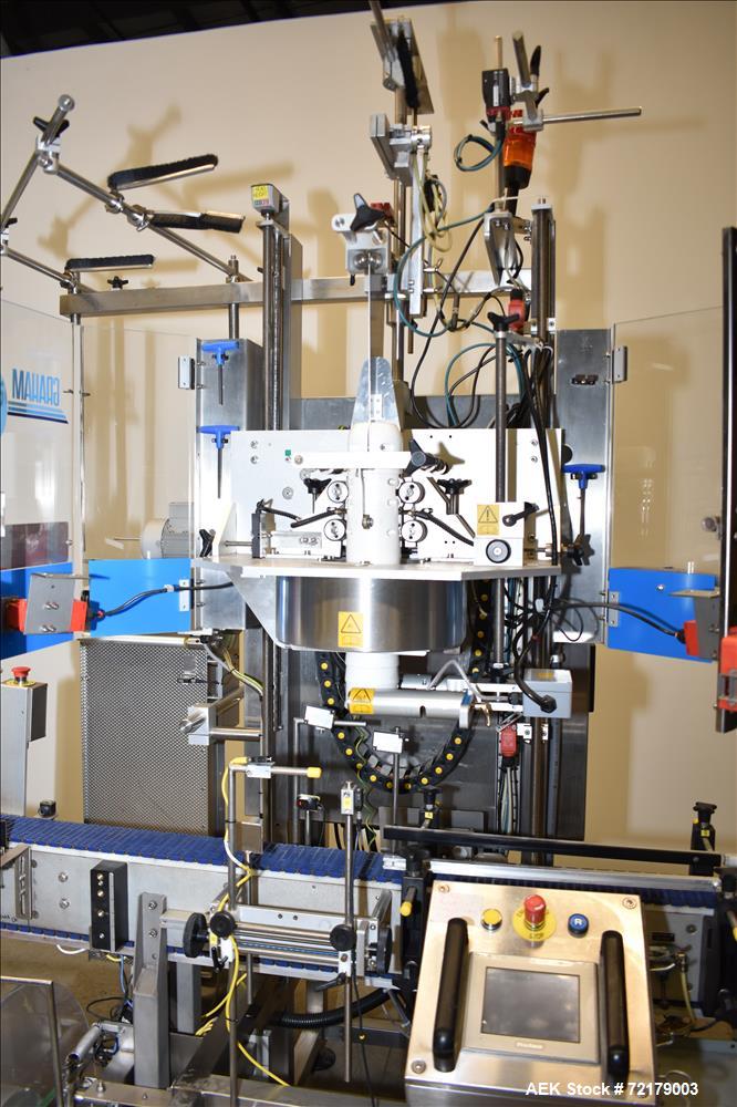 Used Graham Packaging "Sleevit" Sleeve Labeler with Steam Shrink Tunnel