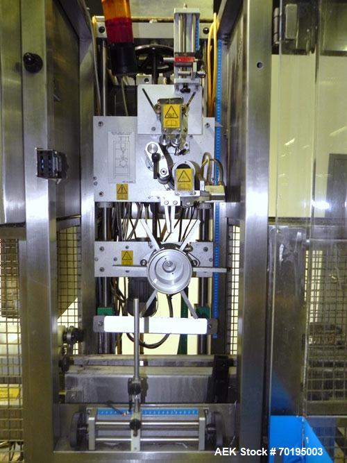 Used- Graham Packaging RF200LRSleeve Labeler. Capable of speeds up to 200 bottles per minute. Sleeve layflat range of 30mm -...