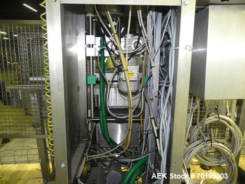 Used Graham Packaging RF200LRSleeve Labeler. Capable of speeds up to 200 bottles per minute. Sleeve layflat range of 30mm - 200mm,cut length up to 200mm. Has dual wormscrew infeed, HMI interface and ...