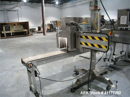 Used Tri-Pack LSA-160 Automatic Shrink Sleeve Labeler Applicator or Neck Bander capable of speeds up to 100 ppm. Has Layflat Range: 35mm to 175mm. Product Diameter: 1" to 4.5". Minimum cut off length...