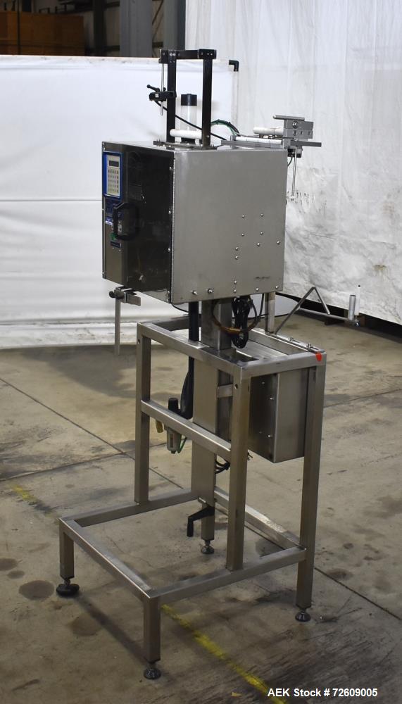 Used Marburg Industries Model M-725-FB Auto Cap Sealer. Approximate speeds up to 200 units per minute. Approximate bands up to a 70mm closure. Has Mitsubishi MELSEC PLC, Mitsubishi drive. Serial# 165...