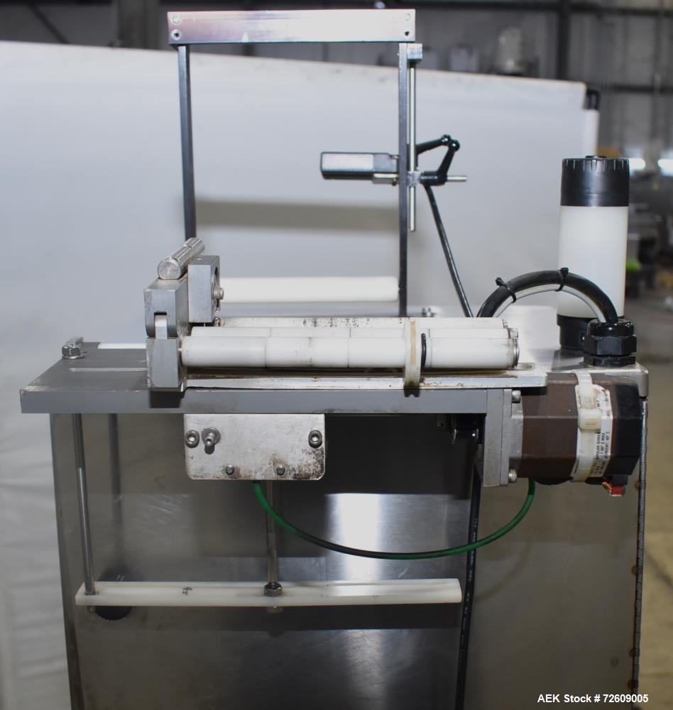 Used Marburg Industries Model M-725-FB Auto Cap Sealer. Approximate speeds up to 200 units per minute. Approximate bands up to a 70mm closure. Has Mitsubishi MELSEC PLC, Mitsubishi drive. Serial# 165...