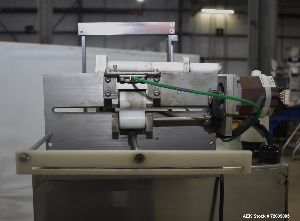 Used Marburg Industries Model M-725-FB Auto Cap Sealer. Approximate speeds up to 200 units per minute. Approximate bands up to a 70mm closure. Has Mitsubishi MELSEC PLC, Mitsubishi drive. Serial# 165...