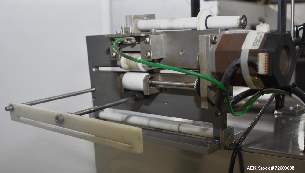 Used Marburg Industries Model M-725-FB Auto Cap Sealer. Approximate speeds up to 200 units per minute. Approximate bands up to a 70mm closure. Has Mitsubishi MELSEC PLC, Mitsubishi drive. Serial# 165...
