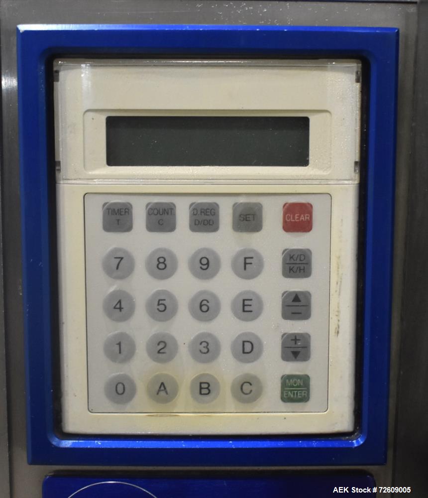 Used Marburg Industries Model M-725-FB Auto Cap Sealer. Approximate speeds up to 200 units per minute. Approximate bands up to a 70mm closure. Has Mitsubishi MELSEC PLC, Mitsubishi drive. Serial# 165...