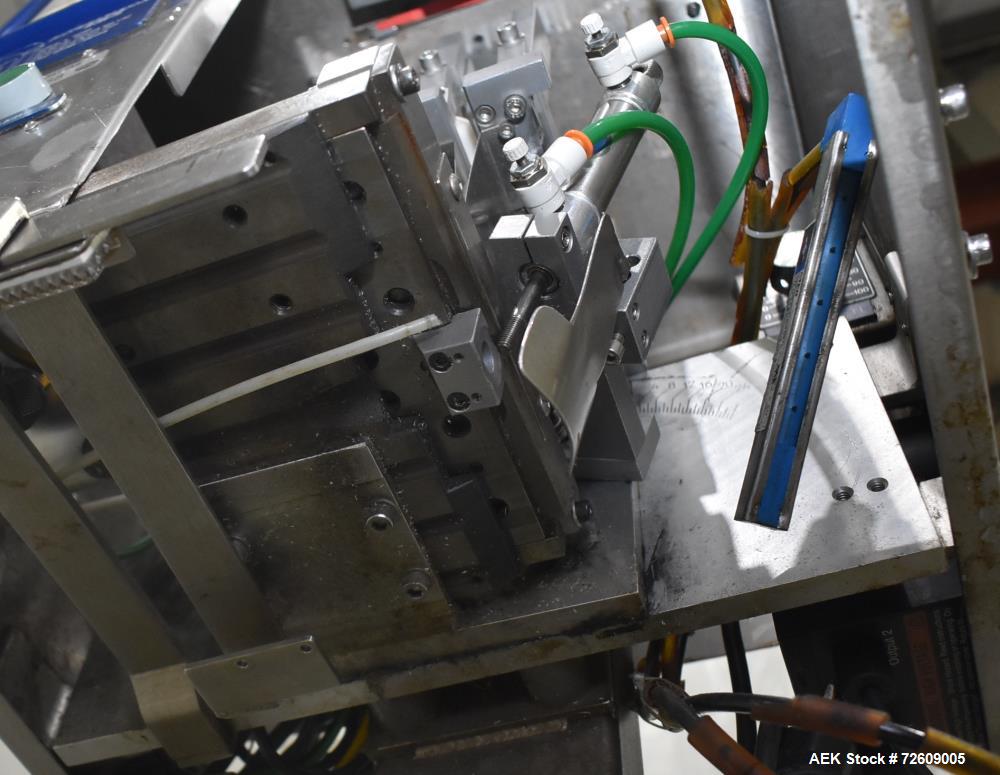 Used Marburg Industries Model M-725-FB Auto Cap Sealer. Approximate speeds up to 200 units per minute. Approximate bands up to a 70mm closure. Has Mitsubishi MELSEC PLC, Mitsubishi drive. Serial# 165...