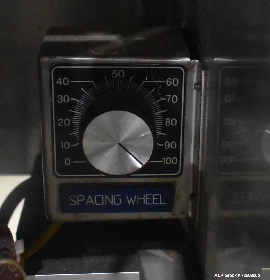 Used Marburg Industries Model M-725-FB Auto Cap Sealer. Approximate speeds up to 200 units per minute. Approximate bands up to a 70mm closure. Has Mitsubishi MELSEC PLC, Mitsubishi drive. Serial# 165...