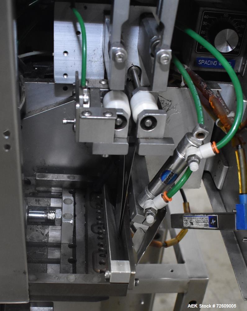 Used Marburg Industries Model M-725-FB Auto Cap Sealer. Approximate speeds up to 200 units per minute. Approximate bands up to a 70mm closure. Has Mitsubishi MELSEC PLC, Mitsubishi drive. Serial# 165...