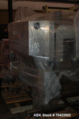 Used NAFM Model LX-350 Sleeving Unit, new 2008.  Includes (2) ES-200-A ovens, (2) OAL classic ovens, unwind and spare parts.  Elec:  3/50/60/480V.