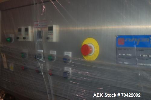 Used NAFM Model LX-350 Sleeving Unit, new 2008.  Includes (2) ES-200-A ovens, (2) OAL classic ovens, unwind and spare parts.  Elec:  3/50/60/480V.