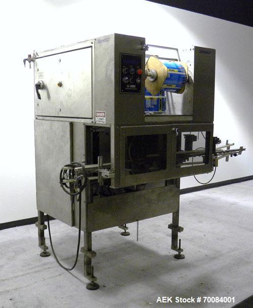 Used SleeveCo Automatic Sleeve Label Machine, Model SL-3000. Capable of speeds up to 50 containers per minute. Maximum size 2-1/2 gallon containers and currently set up on a one gallon round sleeve l...