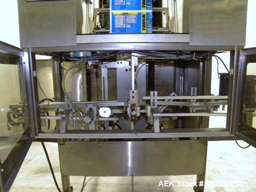 Used SleeveCo Automatic Sleeve Label Machine, Model SL-3000. Capable of speeds up to 50 containers per minute. Maximum size 2-1/2 gallon containers and currently set up on a one gallon round sleeve l...