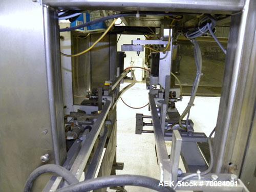Used SleeveCo Automatic Sleeve Label Machine, Model SL-3000. Capable of speeds up to 50 containers per minute. Maximum size 2-1/2 gallon containers and currently set up on a one gallon round sleeve l...