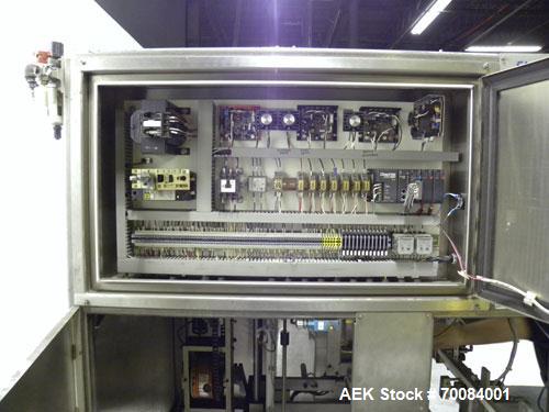 Used SleeveCo Automatic Sleeve Label Machine, Model SL-3000. Capable of speeds up to 50 containers per minute. Maximum size 2-1/2 gallon containers and currently set up on a one gallon round sleeve l...