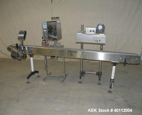 Used Accutek Accusleever Tamper Evident Neck Bander Or Shrink Sleeve Labeler. Capable of speeds up to 60 cpm. Film sizes: Lay flat 16 mm to 150 mm and cut length 16 mm to75 mm. Inclueds a shrink tunn...