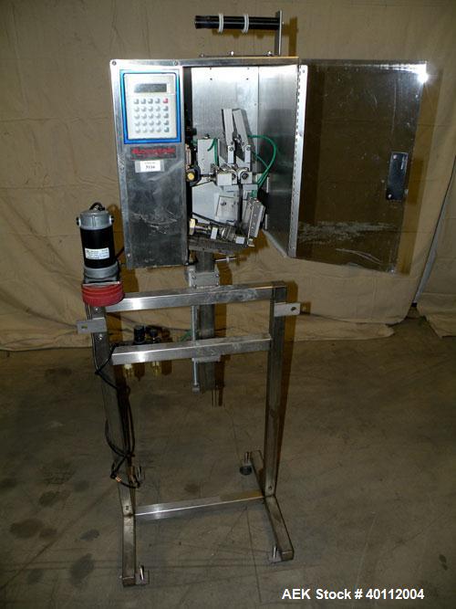 Used Accutek Accusleever Tamper Evident Neck Bander Or Shrink Sleeve Labeler. Capable of speeds up to 60 cpm. Film sizes: Lay flat 16 mm to 150 mm and cut length 16 mm to75 mm. Inclueds a shrink tunn...
