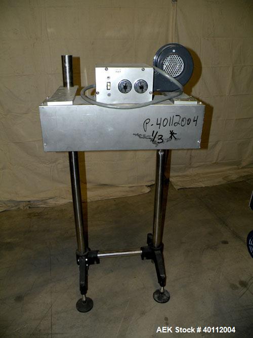 Used Accutek Accusleever Tamper Evident Neck Bander Or Shrink Sleeve Labeler. Capable of speeds up to 60 cpm. Film sizes: Lay flat 16 mm to 150 mm and cut length 16 mm to75 mm. Inclueds a shrink tunn...