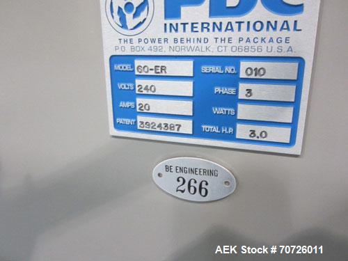 Used PDC Model 60ER shrink sleeve labeler. Capable of speeds from 50 to 130 containers per minute. Sleeve range: (Diam) .375" to 3" or 10mm to 75mm (Height) .625" to 4" or 15mm to 100mm. Has wormscre...