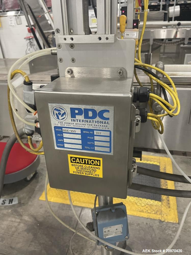 Used-PDC Model R-300Tsert inline sleeve labeler. Has dual worm infeed, with registration and perforating wheel. Last running...