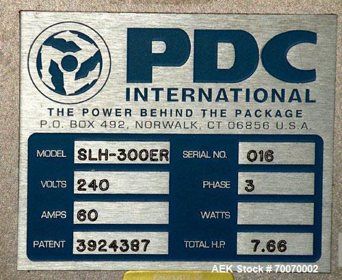 Used PDC Horizontal Shrink Sleeve Labeler, Model SLH-300ER, serial #016. Capable of speeds up to 350 ppm. Sleeve diameter range .325 to 2 inches (10 to 50 mm). Sleeve height range 1.25 to 7 inches (3...
