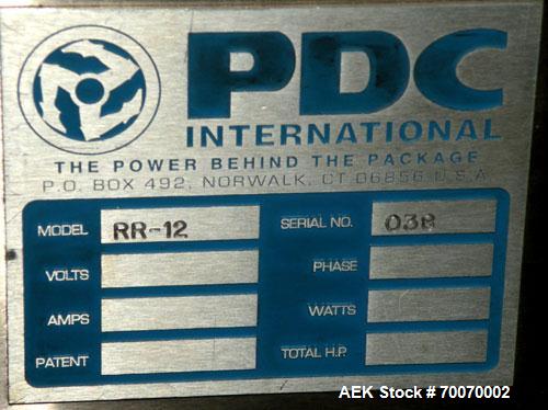 Used PDC Horizontal Shrink Sleeve Labeler, Model SLH-300ER, serial #016. Capable of speeds up to 350 ppm. Sleeve diameter range .325 to 2 inches (10 to 50 mm). Sleeve height range 1.25 to 7 inches (3...