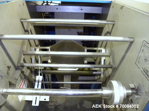Used SleeveCo Model ST-2200R Stretch Sleeve Applicator capable of speeds up to 60 bottles per minute. Currently set up on round gallon containers, has film registration. Machine footprint 48" long x ...