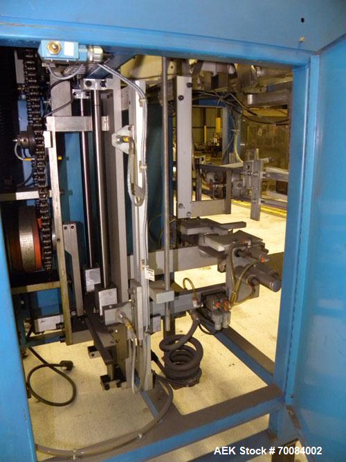 Used SleeveCo Model ST-2200R Stretch Sleeve Applicator capable of speeds up to 60 bottles per minute. Currently set up on round gallon containers, has film registration. Machine footprint 48" long x ...