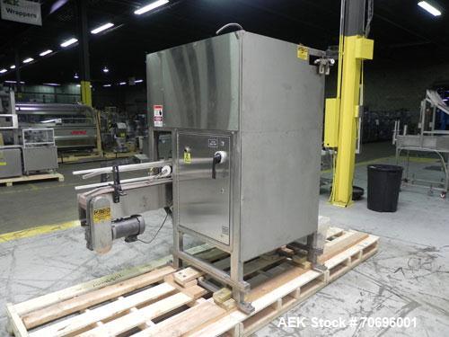 Used Styrotech Model ST-2200 Stretch Sleeve Labeler.  Machine is capable of speeds up to 45 bottles per minute - depending on materials and application. Sizes range up to 2 gallons. Stainless steel f...