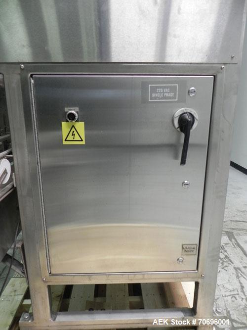 Used Styrotech Model ST-2200 Stretch Sleeve Labeler.  Machine is capable of speeds up to 45 bottles per minute - depending on materials and application. Sizes range up to 2 gallons. Stainless steel f...