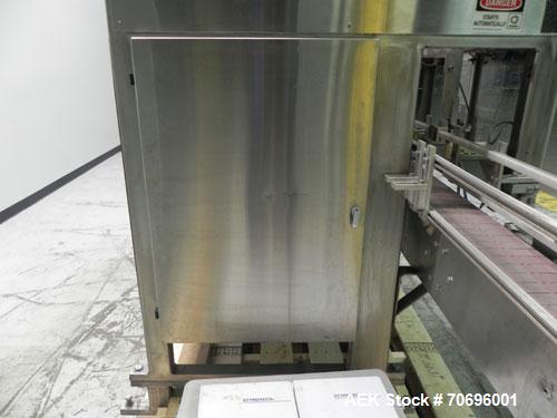 Used- Styrotech Model ST-2200 Stretch Sleeve Labeler.  Machine is capable of speeds up to 45 bottles per minute - depending ...