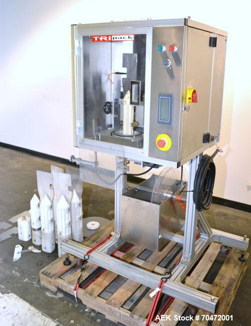 Used TriPack LSA-160 Automatic Shrink Sleeve Labeler Applicator / Neck Bander. Capable of speeds up to 100 BPM. Layflat width 40mm-170mm. Product Diameter 1" to 4.5". Cut off length 30mm-200mm. Thick...