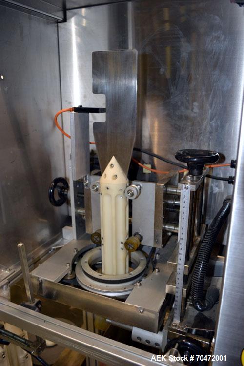 Used TriPack LSA-160 Automatic Shrink Sleeve Labeler Applicator / Neck Bander. Capable of speeds up to 100 BPM. Layflat width 40mm-170mm. Product Diameter 1" to 4.5". Cut off length 30mm-200mm. Thick...