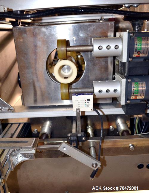 Used TriPack LSA-160 Automatic Shrink Sleeve Labeler Applicator / Neck Bander. Capable of speeds up to 100 BPM. Layflat width 40mm-170mm. Product Diameter 1" to 4.5". Cut off length 30mm-200mm. Thick...