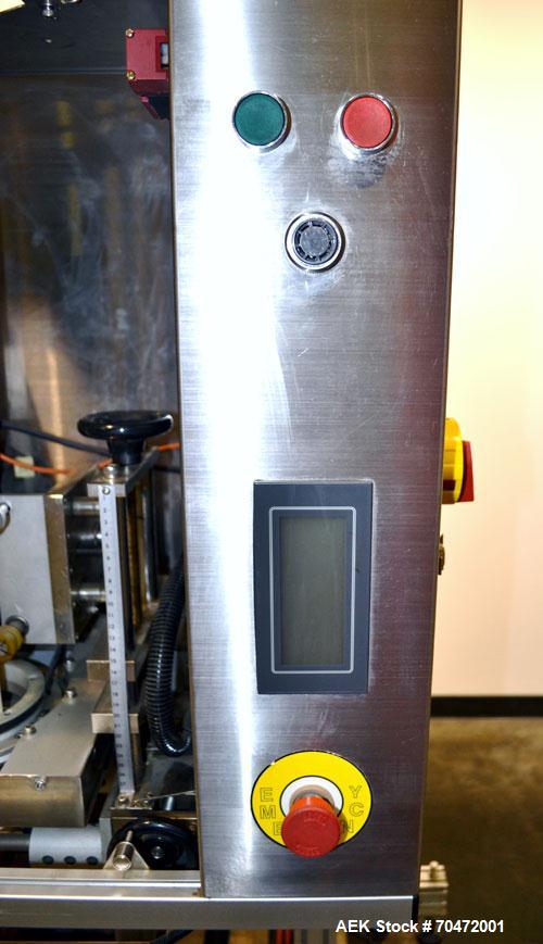 Used TriPack LSA-160 Automatic Shrink Sleeve Labeler Applicator / Neck Bander. Capable of speeds up to 100 BPM. Layflat width 40mm-170mm. Product Diameter 1" to 4.5". Cut off length 30mm-200mm. Thick...